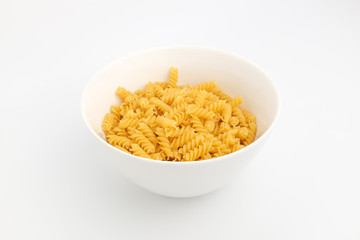 Spiral fusilli on a white background