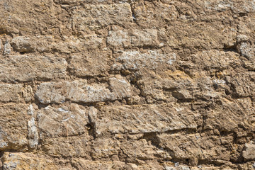 Fragment of an old stone wall.