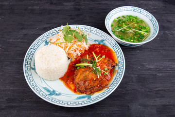  Roast, stewed in tomato sauce, served with rice and fresh salad with broth
