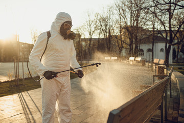 Cleaning and Disinfection on the playground in the sity complex amid the coronavirus epidemic Teams...