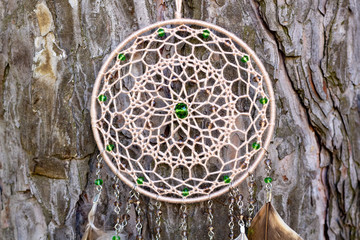 Handmade dream catcher with feathers threads and beads rope hanging