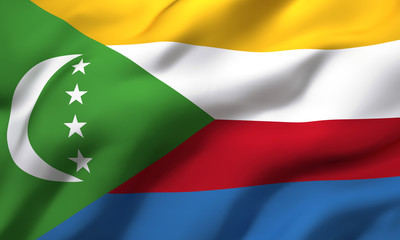 Naklejka premium Flag of Comoros blowing in the wind. Full page Comorian flying flag. 3D illustration.