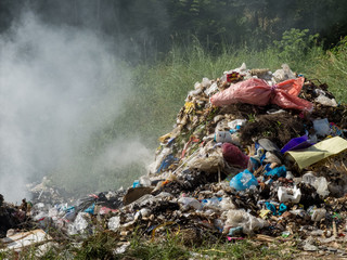 MAEHONGSON PROVINCE, THAILAND-DECEMBER 23 2016, Waste from household in waste landfill. Waste burning in dumping site in THAILAND