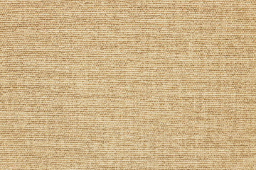 Abstract background of soft golden textile material, texture