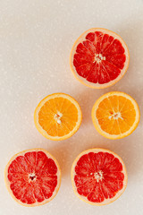 Half of grapefruit, orange, lemon cut for fresh juice. Color splash. Tropical fruits