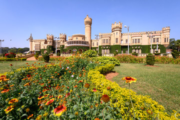 Fototapeta na wymiar Beautiful exterior view of Bangalore Palace with a garden in front.
