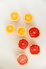 Half of grapefruit, orange, lemon cut for fresh juice. Color splash. Tropical fruits