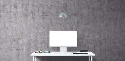 New computer display and office tools on desk. Blank desktop computer screen. Modern creative workspace background. Front view.