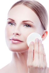 Close-up beauty face of young fashion model woman remove makeup