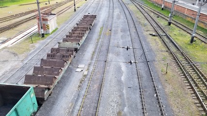 A line of railroad train tanker cars. Industrial Zone. empty wagons. Point on top