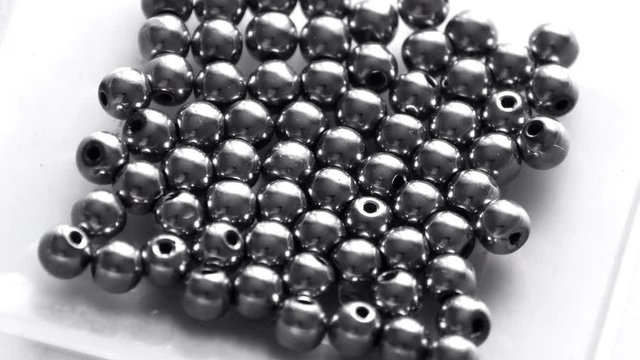 Natural hematite stone, hematite beads rotate or spin clockwise. Mirror stones hematite. A collection of natural stones, crystals and minerals for meditation and relaxation.