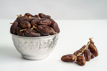 Dates fruit on white background. Medjool dried date palm fruits