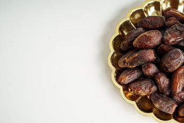 Dates fruit on white background. Medjool dried date palm fruits