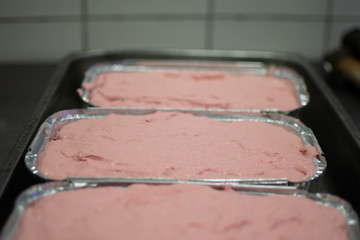 Meatloaf in trays fresh pulled out from the oven