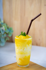 Mango, yogurt in a glass