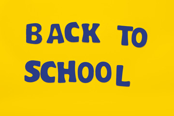 Lettering back to school on yellow background. Illustration for banner