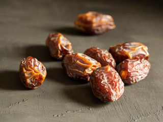 dates on black table with side light