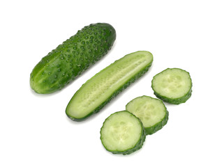 Cucumber and its slices isolated on a white background
