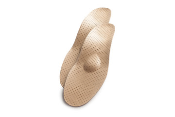 Isolated orthopedic insole on a white background. Treatment and prevention of flat feet and foot diseases. Foot care, comfort for the feet. Wear comfortable shoes. Medical insoles. Flat Feet Correctio