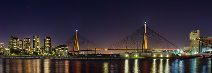 Fototapeta na wymiar Night long exposure of the Anzac Bridge taken from the White Bay cruise terminal in Sydney, Australia.