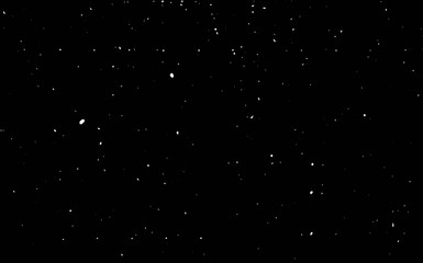 Texture of snowflakes on a black background. Snow, snowfall, snowflakes.