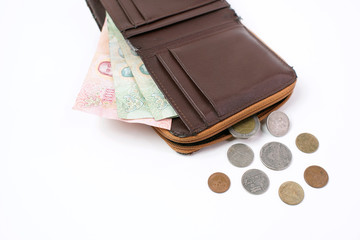 Thai currency banknote 100 baht, 40 baht in old wallet and Thai coins on white background, little money, should buy necessary things, save money                                