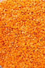 orange lentils in a lot