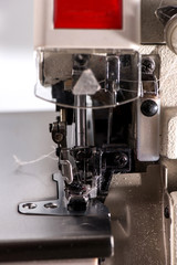 overlock close-up. sewing clothes at the enterprise