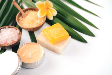 Bowls with homemade organic bath salt, organic soaps and lotion cream. Home Spa and Beauty treatment. Zero waste, organic cosmetics concept.