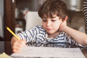 4 years old doing homework at home