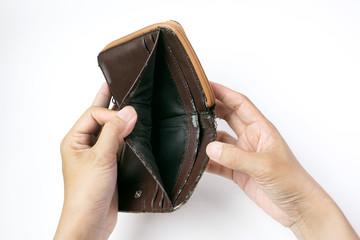 Lack of financial liquidity, Hand open an old empty wallet or purse on white background, no have money                                              
