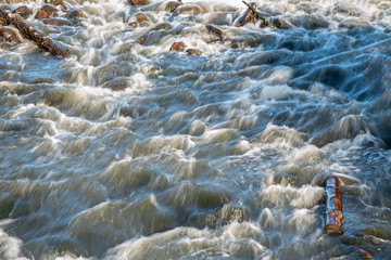 Closeup of river rapids on a sunny day