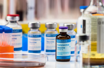 Coronavirus covid-19 experimental vaccine in a laboratory, conceptual image