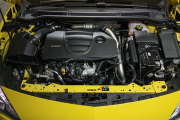 Yellow sports car engine bay