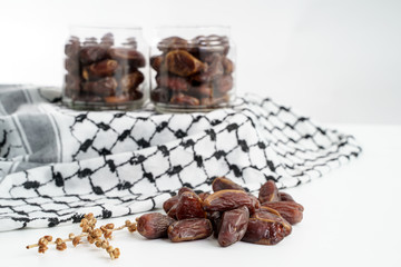 Dates fruit on white background. Medjool dried date palm fruits