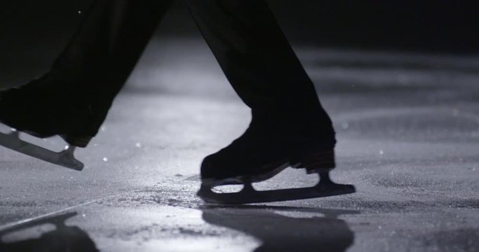 children figure skating on ice slow motion