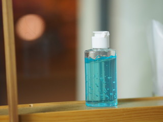 Hand Sanitizer, gel alcoholic mixture with gelatin in clear Plastic bottle with pump pushing wash clean dirty to prevent germs protect Contagious disease corona virus, covid-19