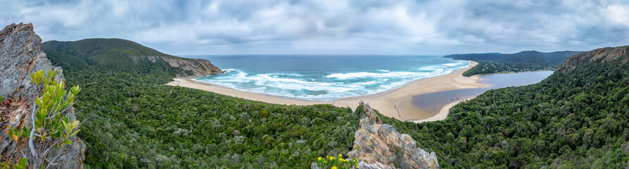 panoramic view of secluded beach and estuary