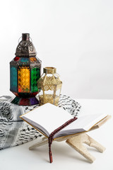Naklejka na ściany i meble Arabic candle lantern with holy quran, Ramadan kareem background