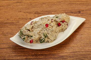 Vagan dietary cusine - mutabal with granet seeds