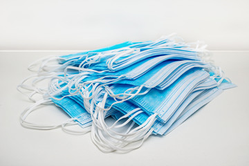 Pile of surgical face masks to protect against virus infections