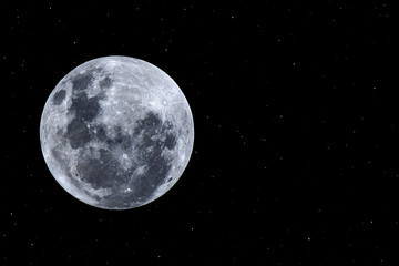 Full moon with many stars in the night.