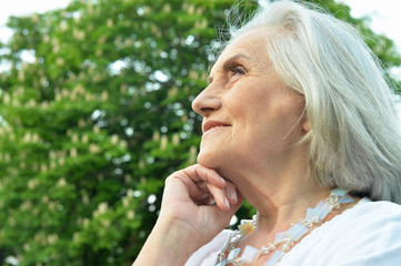 Close-up portrait of senior beautiful smiling woman
