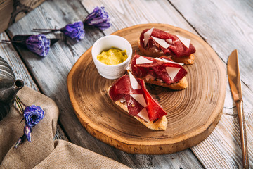 Italian snack appetizing prosciutto bruschetta