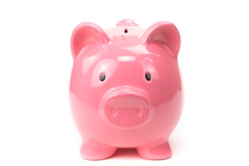 pink piggy bank in full-face isolated on white background cutted . Savings concept, rainy-day reserve