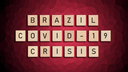 Brazil Covid 19 crisis written with wooden tiles over red background