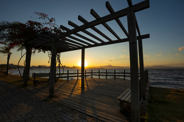 People on the deck at sunset in Florianopolis, Santa Catarina, Brazil