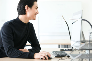 young designer working on computer