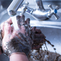 Washing dirty hands.