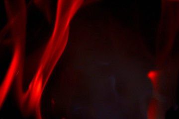 Beautiful fire flame on a black background. Blurry abstraction